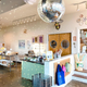 A photo of a Muddy's Bake Shop that's very inviting and decorated with a disco ball.